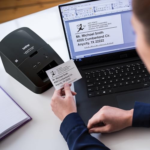 Brother QL 600 Desktop Monochrome Label Printer  up to 2 4 Label Width  No ink required  uses Brother Genuine DK drop in Rolls for Fast Labeling and easy integration with Microsoft applications
